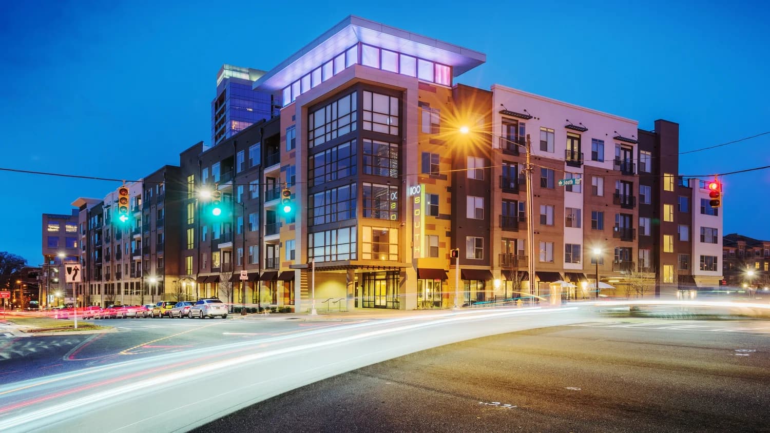 1100 South — Multi-family electrical with podium parking, amenity systems, and exterior lighting